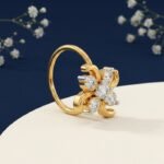 Side view of modern pinwheel diamond nose ring for women