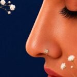 Front view of three stone diamond nose ring elegant design