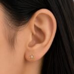 Amara floral heart lab-grown diamond stud earring worn on ear