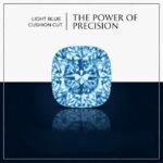Premium macro view of a loose brilliant cushion cut lab grown diamond resting on a neutral professional background, showcasing soft rounded corners.