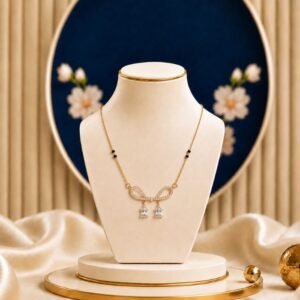 Bow Wave Lab Grown Diamond Mangalsutra featuring elegant ribbon-inspired wave motifs with sparkling drop lab-grown diamonds and refined black bead chain detailing.