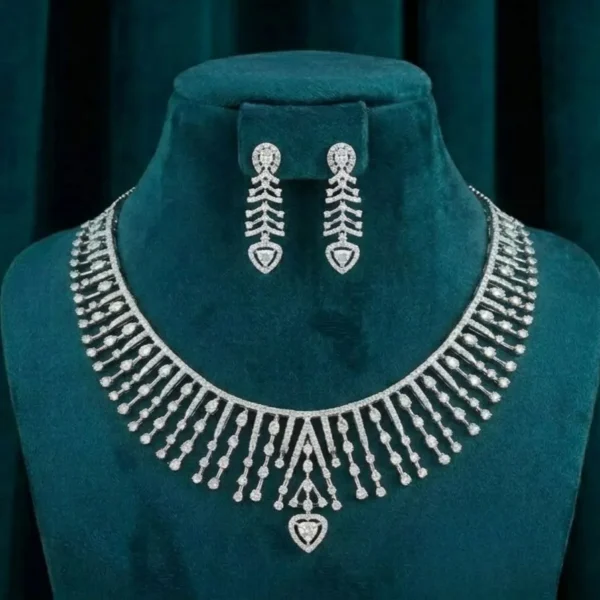 Cascade Fringe Diamond Set featuring flowing cascade patterns with elegant fringe detailing adorned with sparkling lab-grown diamonds and matching earrings.