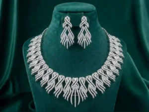 Celestial Feather Diamond Necklace Set featuring graceful feather-inspired motifs adorned with sparkling lab-grown diamonds and matching elegant earrings.
