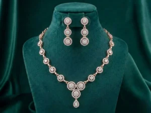 Circle Halo Station Necklace Set featuring elegant circular halo motifs adorned with sparkling stones and matching sophisticated earrings.