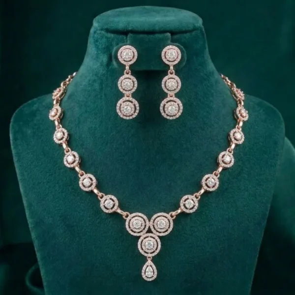 Circle Halo Station Necklace Set featuring elegant circular halo motifs adorned with sparkling stones and matching sophisticated earrings.