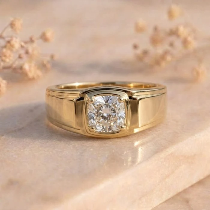 Cushion Cut Signet Solitaire Diamond Ring Cushion Cut Signet Solitaire Diamond Ring featuring a bold signet-style band with a sparkling cushion-cut lab-grown solitaire diamond and polished finish.