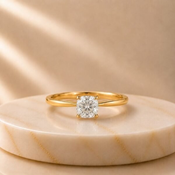 Cushion Cut Solitaire Yellow Gold Ring featuring a sparkling cushion-cut lab-grown diamond set in an elegant polished yellow gold band.