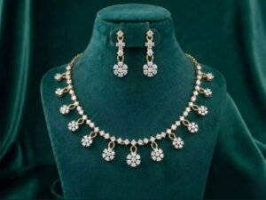 Daisy Cascade Diamond Necklace Set featuring delicate daisy-inspired motifs with cascading detailing adorned with sparkling lab-grown diamonds and matching earrings.