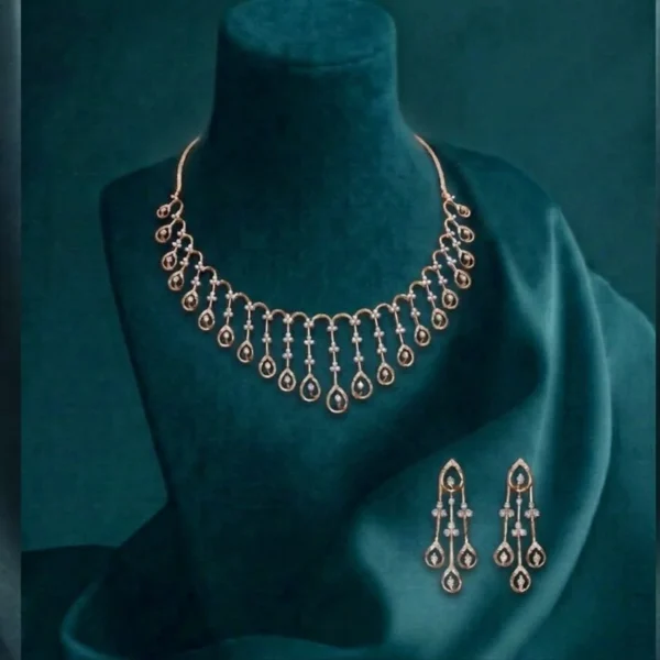 Dazzling teardrop CVD diamond necklace set for women featuring high-clarity lab-grown pear-cut stones in a 14k gold setting.