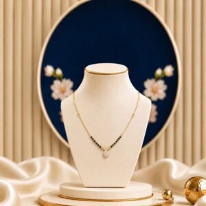 Dewdrop Solitaire Lab Grown Diamond Mangalsutra featuring a delicate dewdrop-inspired solitaire pendant adorned with a sparkling lab-grown diamond and elegant black bead chain detailing.