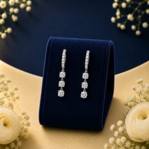 Triple solitaire lab-grown diamond drop hoop earrings in 14 carat gold