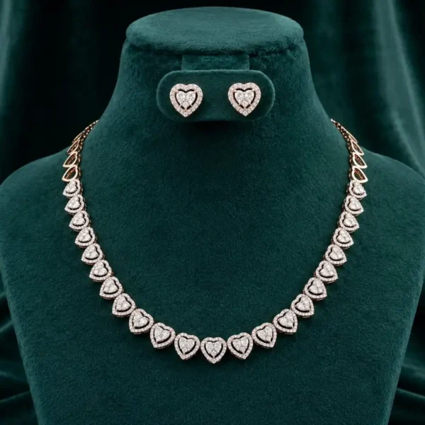 Romantic heart-link necklace and earring set featuring pavé-set diamond accents on a luxury velvet display.