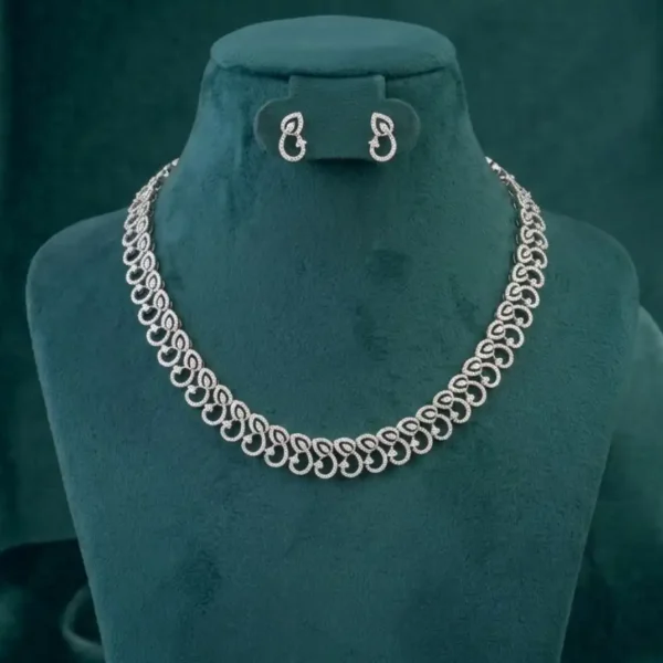 Elegant interlocking diamond necklace set featuring two connected circular hoops pave-set with round brilliant cut CVD diamonds