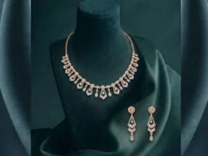 Best luxury CVD diamond necklace set for women featuring a tiered cascading drop design in hallmarked 14k gold.