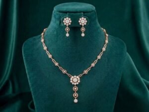 Floral Cluster Chain Link Necklace Set featuring delicate floral cluster motifs connected with elegant chain links and matching sparkling earrings.