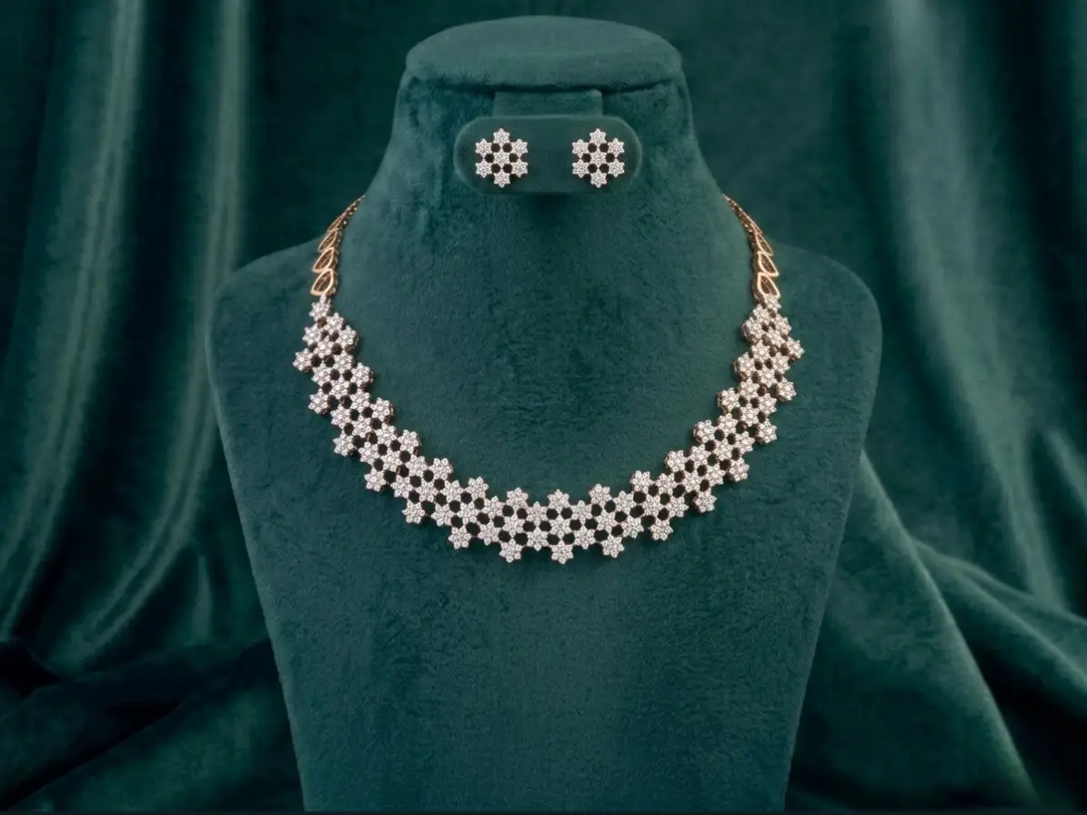 Floral Web Diamond Necklace Set Intricate web-patterned necklace and earring set featuring delicate diamond floral accents on a luxury display.