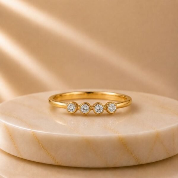 Four Bezel Diamond Gold Ring featuring four sparkling bezel-set lab-grown diamonds crafted in an elegant polished gold band.