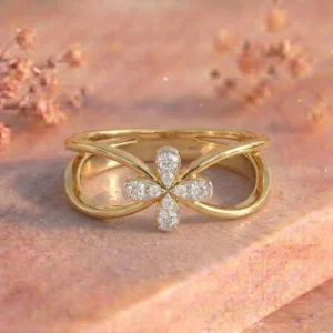 Four Petal Flower Pavé Open Band Yellow Gold Ring featuring delicate four-petal floral motifs adorned with pavé-set lab-grown diamonds in an elegant open band design.