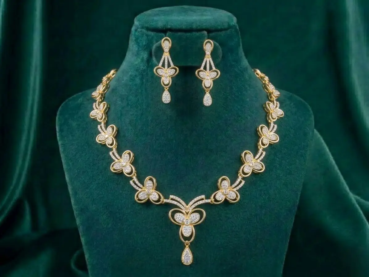 Golden Petal Diamond Necklace Set Golden Petal Diamond Necklace Set featuring elegant petal-inspired motifs adorned with sparkling lab-grown diamonds and matching sophisticated earrings.