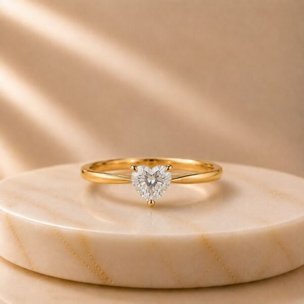 Heart Cut Solitaire Yellow Gold Ring featuring a romantic heart-shaped lab-grown diamond set in an elegant polished yellow gold band.