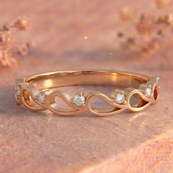 Infinity Loop Station Diamond Rose Gold Band Ring featuring elegant infinity loop stations adorned with sparkling lab-grown diamonds in a luxurious rose gold band.