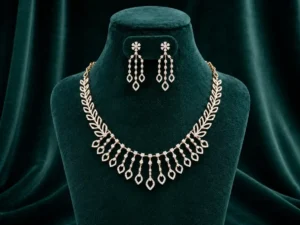 Stunning fringe-style necklace featuring delicate diamond-encrusted leaf motifs that drape elegantly on a velvet display.