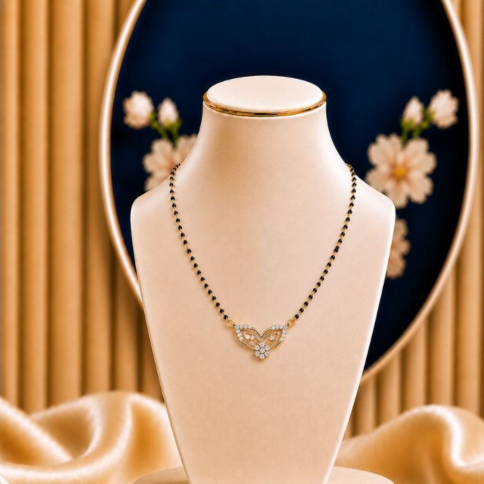 Lotus Wing Lab Grown Diamond Mangalsutra Lotus Wing Lab Grown Diamond Mangalsutra featuring elegant lotus and wing-inspired motifs adorned with sparkling lab-grown diamonds and refined black bead chain detailing.