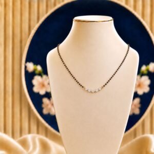 Lunara Spark Diamond Mangalsutra featuring elegant moon-inspired contemporary motifs adorned with sparkling lab-grown diamonds and refined black bead chain detailing.