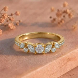 Marquise Pavé Cluster Solitaire Yellow Gold Ring featuring a marquise-inspired pavé diamond cluster with a sparkling solitaire design in elegant yellow gold.