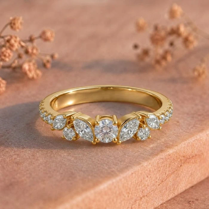 Marquise Pavé Cluster Solitaire Yellow Gold Ring Marquise Pavé Cluster Solitaire Yellow Gold Ring featuring a marquise-inspired pavé diamond cluster with a sparkling solitaire design in elegant yellow gold.