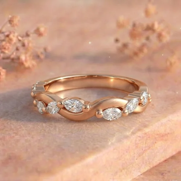 Marquise Station Wave Rose Gold Eternity Band Ring featuring flowing wave-inspired detailing with marquise diamond stations in a luxurious rose gold eternity band design.