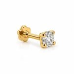 Three-quarter view of Lumi Solitaire Lab Grown Diamond Nose Pin with round diamond, yellow gold prongs and flower screw back.