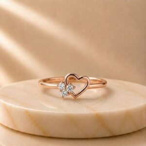 Open Heart Trio Diamond Rose Gold Ring featuring elegant open heart motifs adorned with three sparkling lab-grown diamonds in a luxurious rose gold finish.