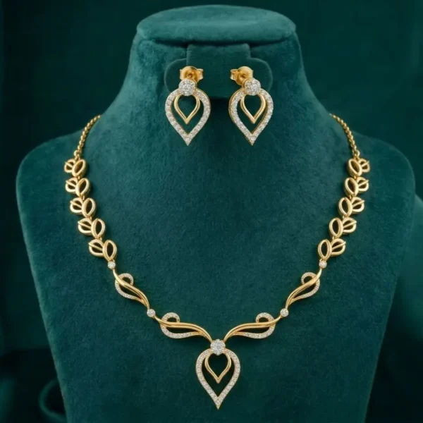 Open Leaf Vine Necklace Set featuring graceful leaf and vine-inspired patterns adorned with sparkling stones and matching elegant earrings.