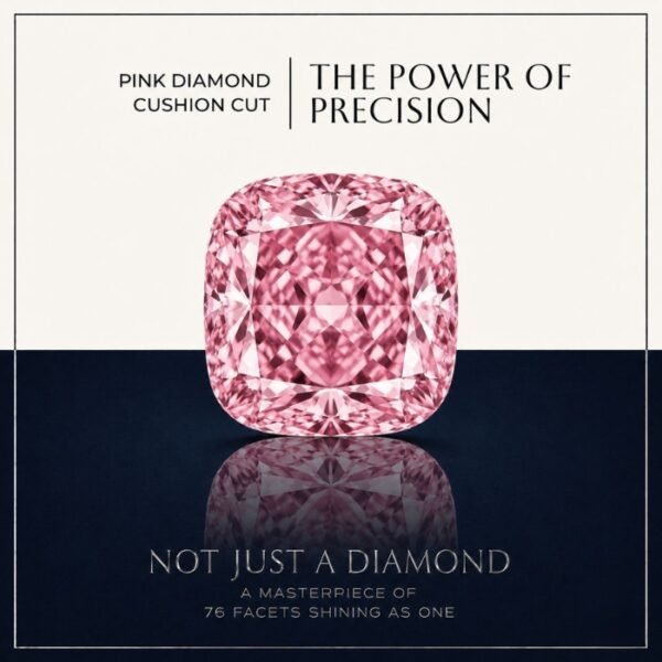 Loose fancy vivid pink cushion cut diamond showing perfect rounded square faceting and brilliant light reflections on a soft white surface.
