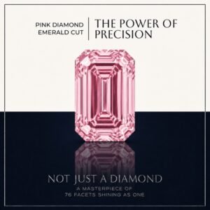 Loose fancy vivid pink emerald cut diamond showing clean step-cut faceting and linear light reflections on a soft white surface.