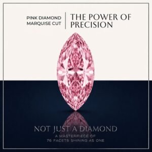 Loose fancy vivid pink marquise diamond showing sharp pointed tips and brilliant light dispersion on a soft white surface.