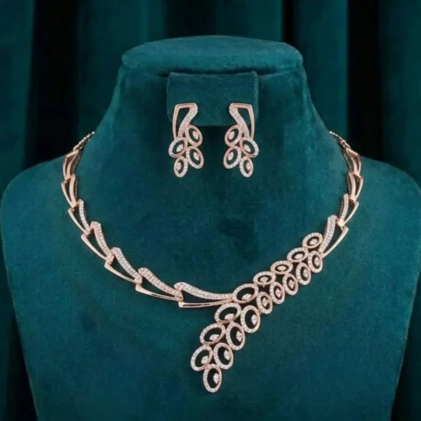 Peacock Plume Diamond Set featuring elegant peacock feather-inspired motifs adorned with sparkling lab-grown diamonds and matching sophisticated earrings.