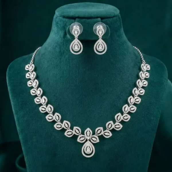 Petal Grace Diamond Necklace Set featuring delicate petal-inspired motifs adorned with sparkling lab-grown diamonds and matching elegant earrings.
