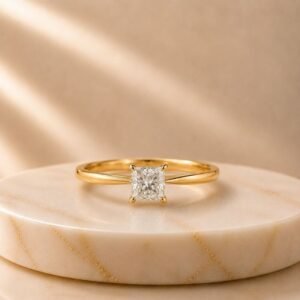 Princess Cut Solitaire Yellow Gold Ring featuring a sparkling princess-cut lab-grown diamond set in an elegant polished yellow gold band.