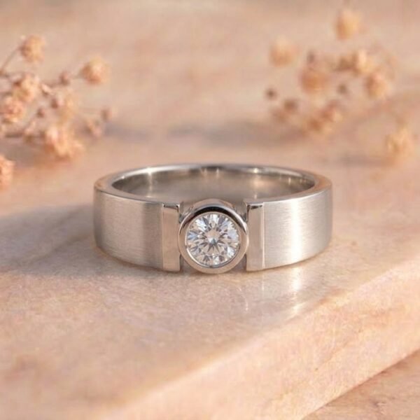 Round Bezel Solitaire Brushed White Gold Ring featuring a brilliant round bezel-set lab-grown diamond with a sleek brushed white gold finish.