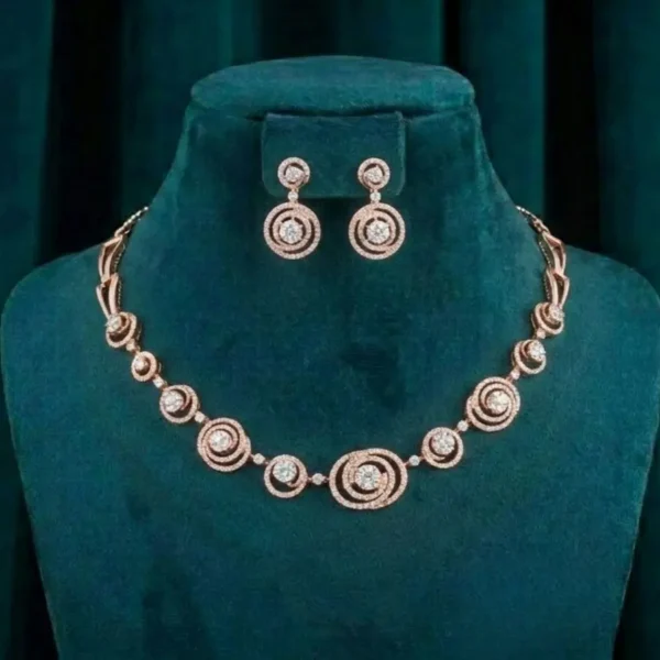 Spiral Orbit Diamond Set featuring elegant spiral and orbit-inspired motifs adorned with sparkling lab-grown diamonds and matching sophisticated earrings.