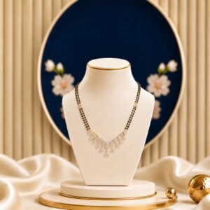 Stardust Fringe Lab Grown Diamond Mangalsutra featuring cascading star-inspired drop motifs adorned with sparkling lab-grown diamonds and elegant black bead chain detailing.
