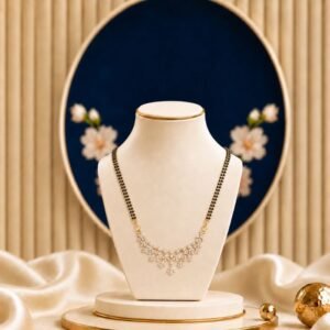 Starfall Arc Lab Grown Diamond Mangalsutra featuring a graceful arc neckline with sparkling floral-inspired motifs adorned with shimmering lab-grown diamonds and elegant black bead detailing.