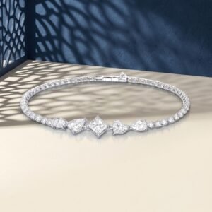 A professional macro photo of a multi-shape lab diamond tennis bracelet with princess and pear-cut stones