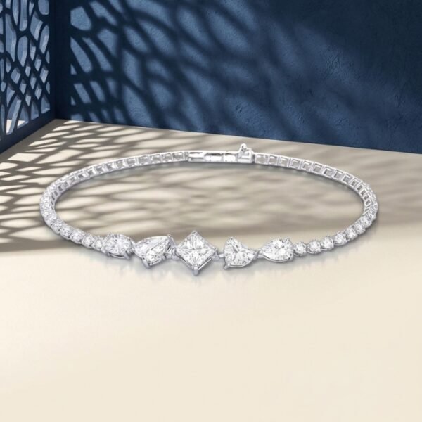 A professional macro photo of a multi-shape lab diamond tennis bracelet with princess and pear-cut stones