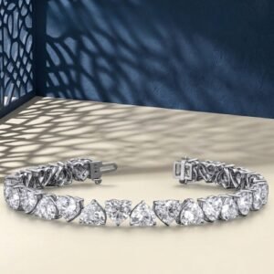 A high-end macro photo of a heart-shape lab diamond tennis bracelet