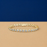 Teardrop bezel-set lab-grown diamond tennis bracelet available in gold and sterling silver 925 finishes.