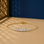 Marquise lab diamond chain bracelet featuring a flare of stones on a gold link chain.