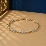 Infinity Link Lab Diamond Bracelet featuring pavé diamonds and high-polish yellow gold interlocking loops.